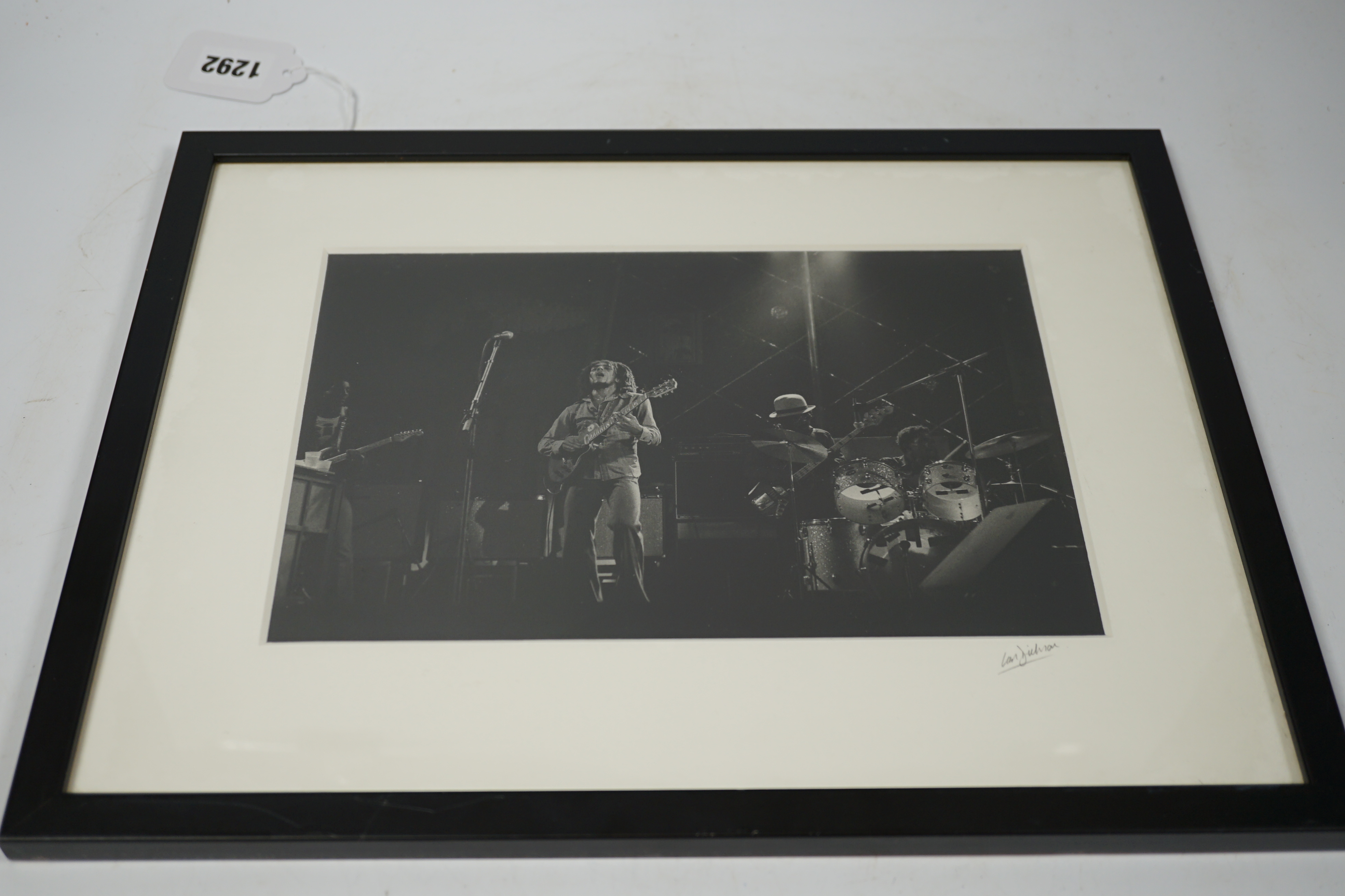 Ian Dickson, a black and white photograph of Bob Marley, framed, signed by Dickson on the mount, 17 x 25cm